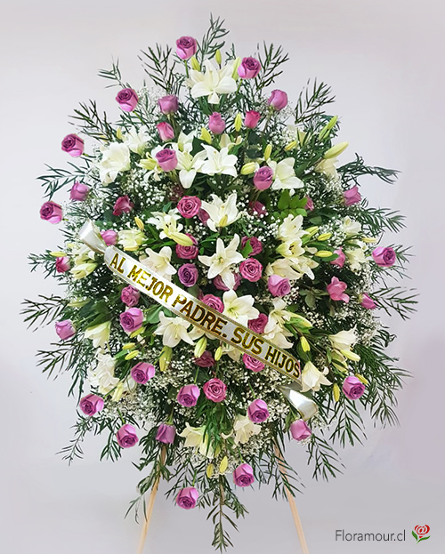 Magnífica ofrenda montada en atril (2 mts alt.), confeccionada con rosas de primera calidad y liliums (Disp. Sólo Santiago de Chile) seleccione color de rosas disponible: